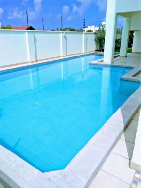 Roma Stays - 1 bedroom at Seville Residency with Swimming pool behind Go-Cart near Sarova